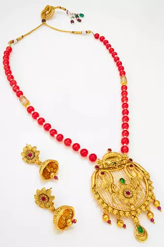 Latest gold plated handmade moti mala jewellery set with pair of matching earrings for women and girls