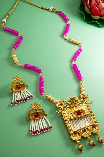 Latest gold plated handmade moti mala jewellery set with pair of matching earrings for women and girls
