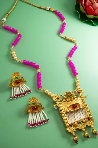 Latest gold plated handmade moti mala jewellery set with pair of matching earrings for women and girls