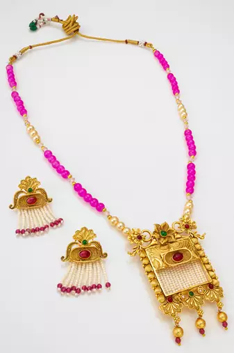 Latest gold plated handmade moti mala jewellery set with pair of matching earrings for women and girls