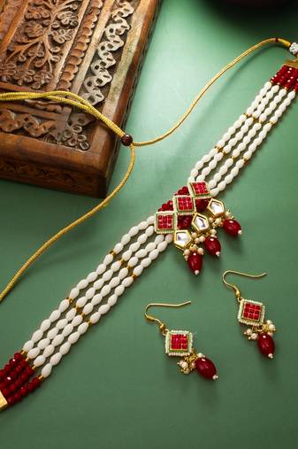 White and red color handmade kundan moti mala jewellery set with pair of earrings