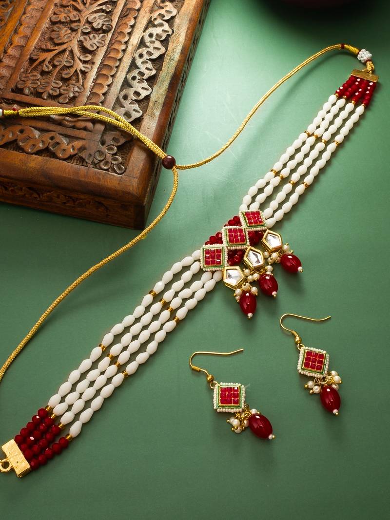 White and red color handmade kundan moti mala jewellery set with pair of earrings
