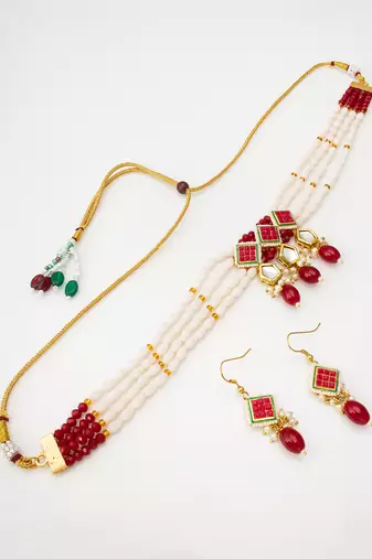 White and red color handmade kundan moti mala jewellery set with pair of earrings