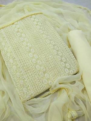 Yellow  chikankari embroidered unstitched dress material 1