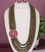 Cz stone studded pendant set with semi precious beads