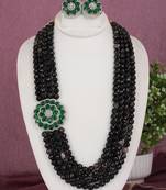 Cz stone studded pendant set with semi precious beads