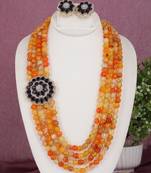 Cz stone studded pendant set with semi precious beads