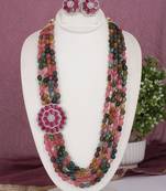 Cz stone studded pendant set with semi precious beads