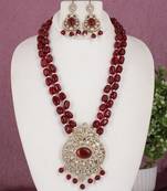 Cz stone studded pendant set with semi precious beads