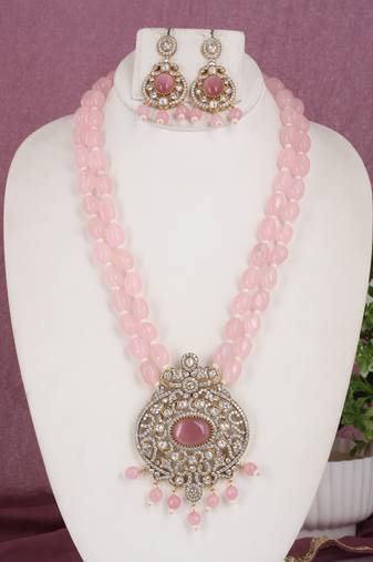 Cz stone studded pendant set with semi precious beads