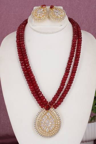 Cz stone studded pendant set with semi precious beads
