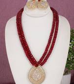 Cz stone studded pendant set with semi precious beads