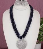 Cz stone studded pendant set with semi precious beads