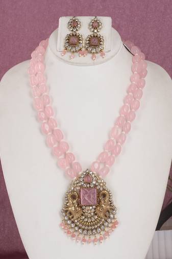 Cz stone studded pendant set with semi precious beads