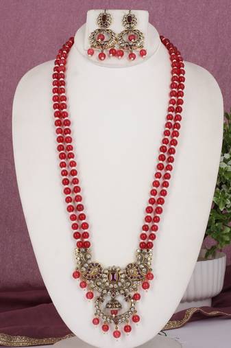Cz stone studded pendant set with semi precious beads