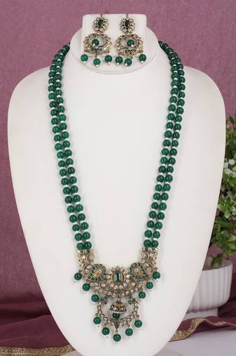 Cz stone studded pendant set with semi precious beads