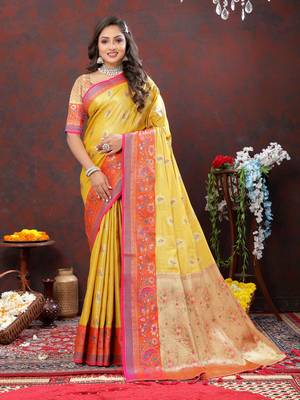 Women's latest design yellow color kanjivaram silk saree with blouse piece 1