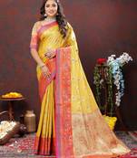 Women's latest design yellow color kanjivaram silk saree with blouse piece