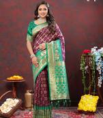 Lovely Purple Soft Patola Silk Blend Saree With Meenakari Weaving Motifs And Rich Zari Weaving Pallu