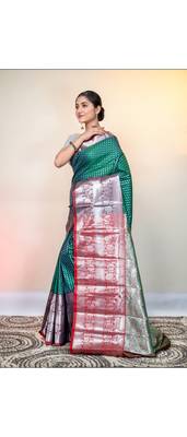 kanjivaram saree in green color with silver zari woven motifs and border 2