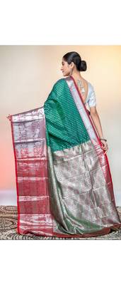 kanjivaram saree in green color with silver zari woven motifs and border 3