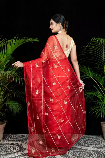 Red embroidered organza saree with gota work