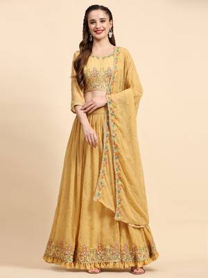 Yellow Sequine Embroidered Faux Georgette Fabric flared Lehenga Choli with Dupatta. 3