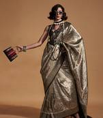 Black and gold silk blend woven designer saree