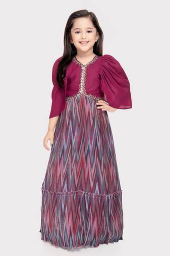 Betty magenta colored stone worked polyester gown for girls