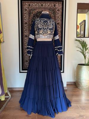 Blue embroidered crop top and layered lehenga 5