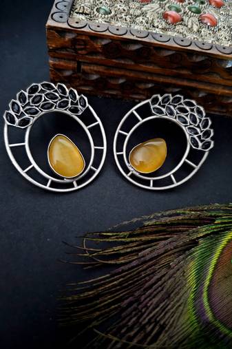 German silver stoned fixed round shapped earrings