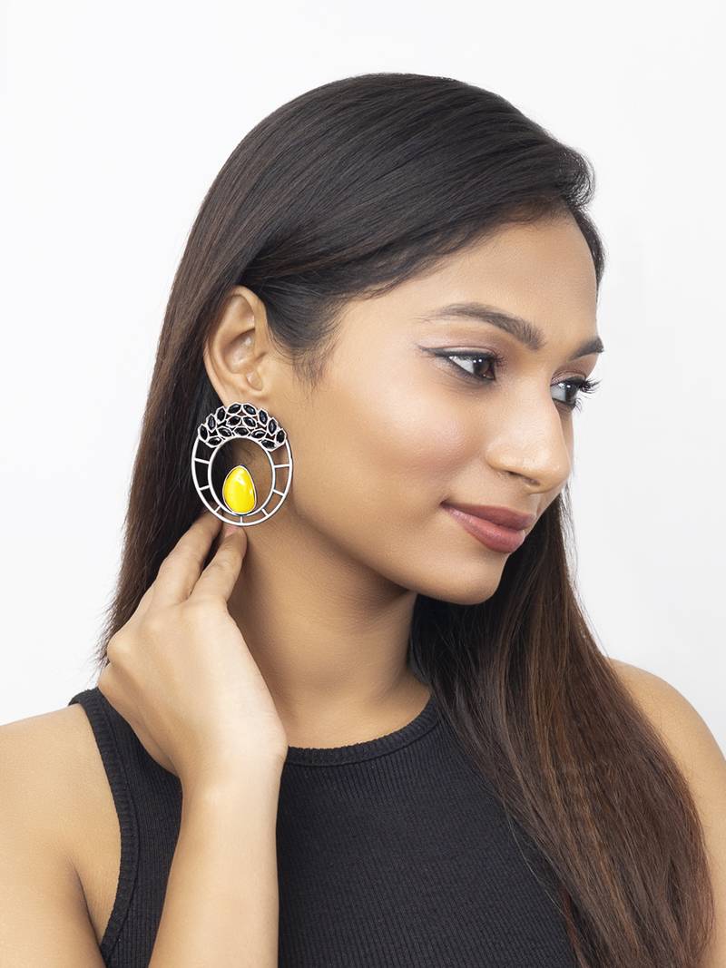 German silver stoned fixed round shapped earrings