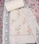 Beige embroidered unstitched dress material