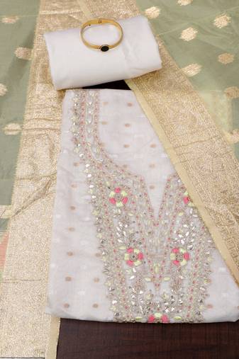 Off white & yellow embroidered unstitched dress material