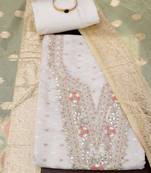 Off white & yellow embroidered unstitched dress material