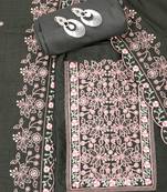 Green embroidered unstitched dress material