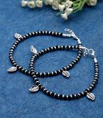 Sasha oxidised german silver anklets pair with black stones &leaf beads