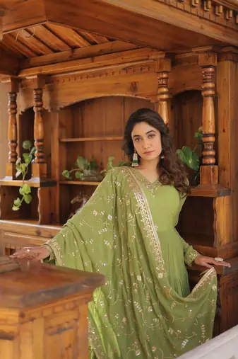 olive green faux georgette with sequins embroidered gown