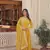 yellow faux georgette with sequins embroidered gown