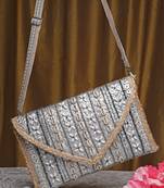sisal silver & baked beige striped & embellished jute sling bag