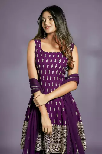 LIGHT WINE SHARARA SET AND MATCHING KURTA TOP WITH GOLD BUTIS, EMBROIDERED AND A MATCHING DUPATTA. STITCHED