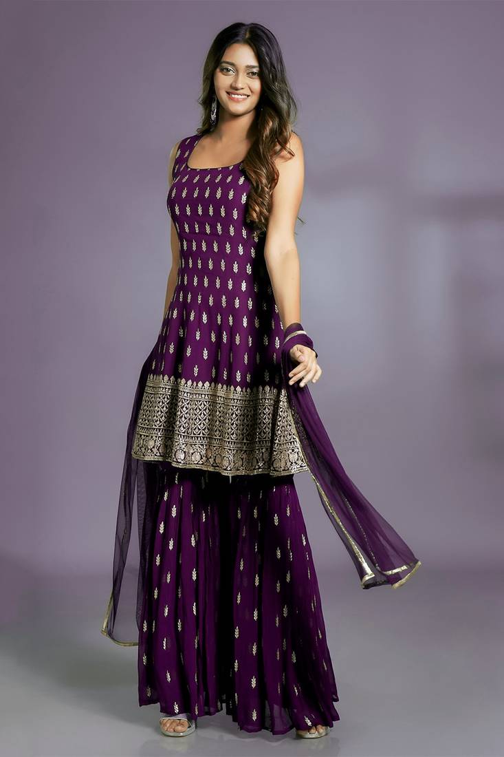 LIGHT WINE SHARARA SET AND MATCHING KURTA TOP WITH GOLD BUTIS, EMBROIDERED AND A MATCHING DUPATTA. STITCHED
