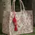 jungle natural & wine toile jacquard cotton handheld bag