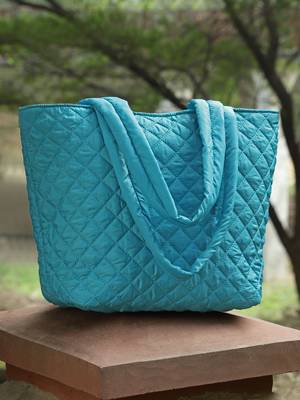 uno turquoise harlequin quilted polyester tote bag 1