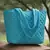 uno turquoise harlequin quilted polyester tote bag