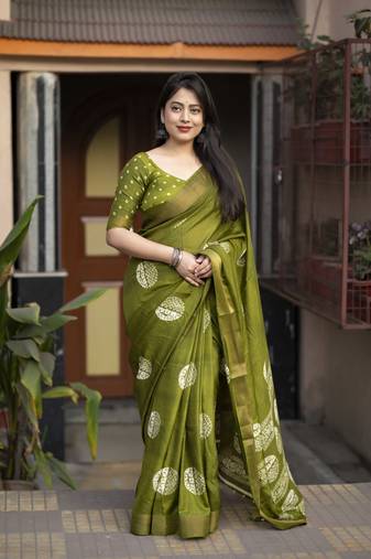 Green soft cotton crape silk saree with unstitched blouse piece