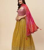 Lovely Mustard Sequins Georgette Haldi Wear Lehenga Choli