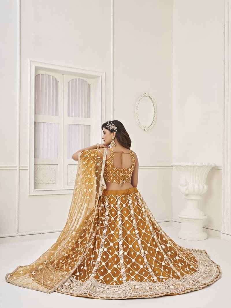 Stunning Brown Thread Work Net Wedding Wear Lehenga Choli