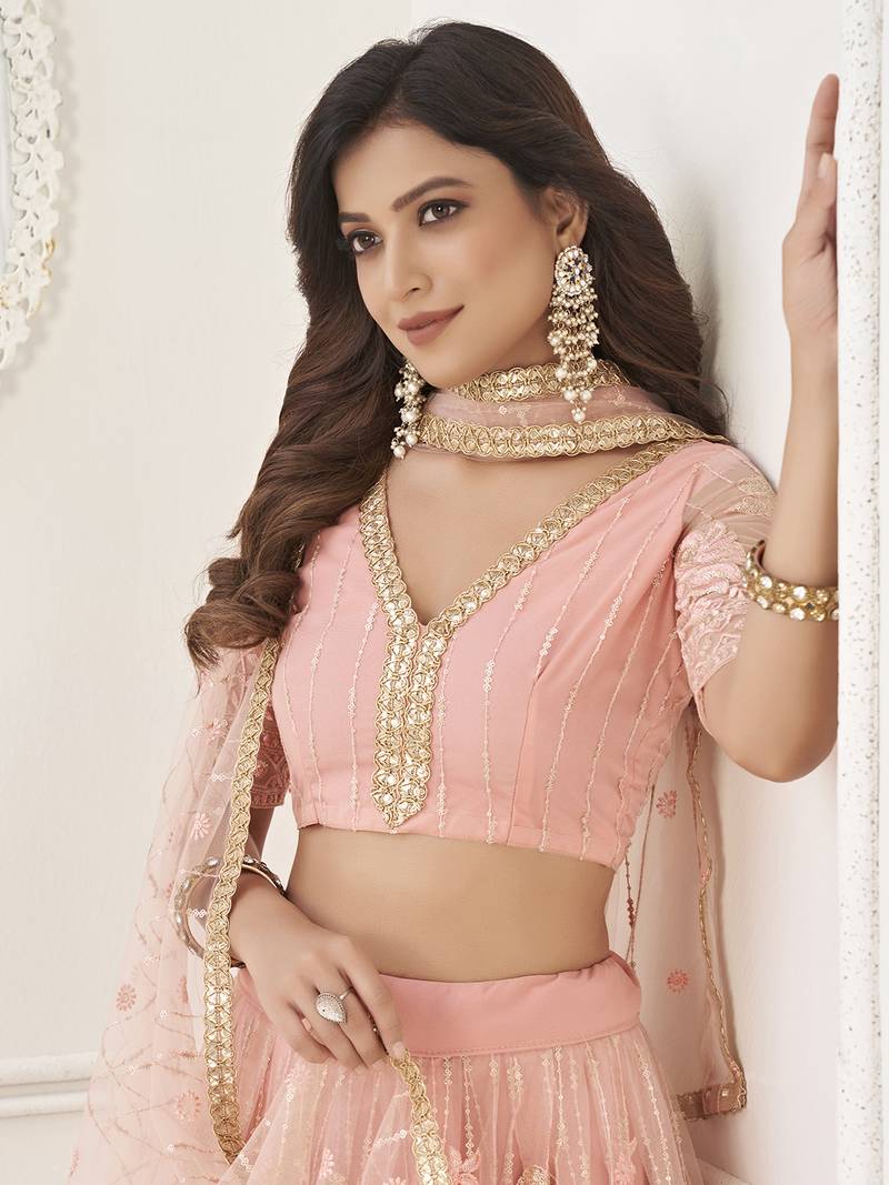 Fascinating Peach Sequin Net Bridesmaid Lehenga Choli With Dupatta