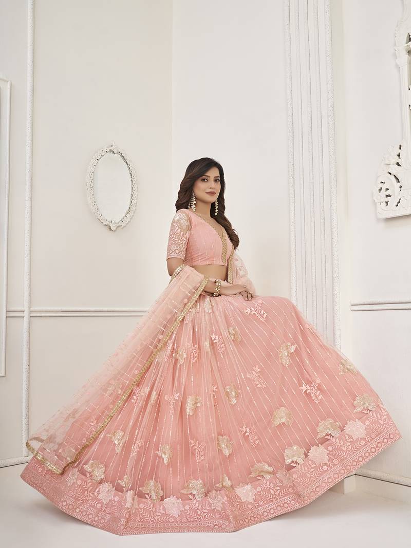 Fascinating Peach Sequin Net Bridesmaid Lehenga Choli With Dupatta
